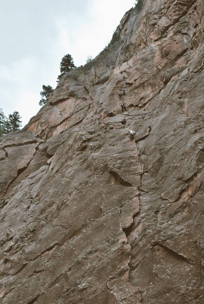 Rock climbers scaling the wall at Eldorado Canyon, a state park in Colorado