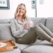 Woman sitting on the couch in comfy loungewear